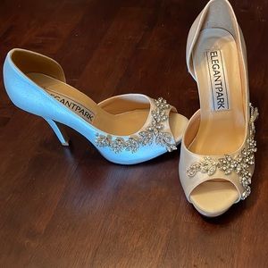 Heels used for wedding ceremony. Ivory with flower gemstone design.